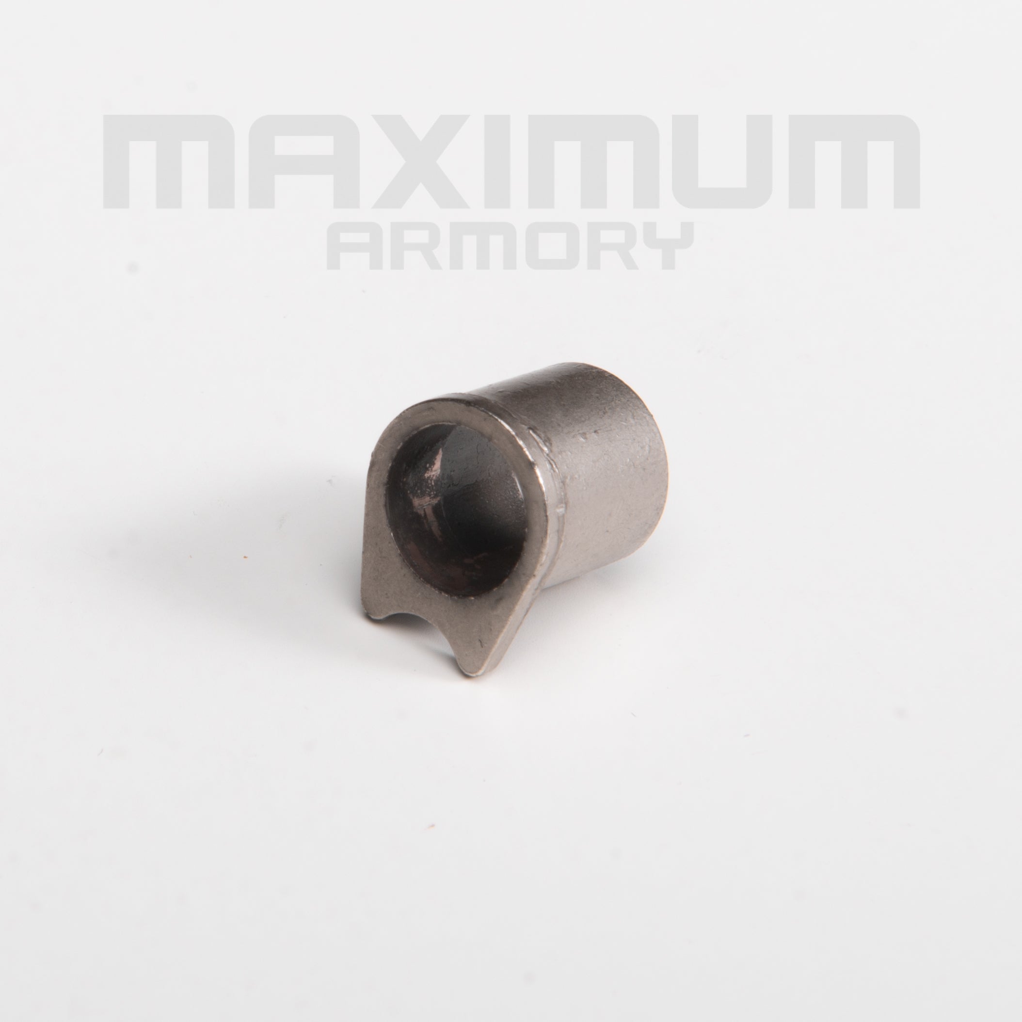 Top view of the M1911 1:2.05 Black/White Toy Guns Barrel Bushing, designed for enhanced barrel stability and smooth slide movement in realistic toy gun models.