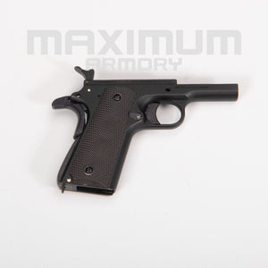 Top view of the M1911 1:2.05 Black/White Toy Guns Frame/Receiver, showcasing its solid structure and precise machining, essential for realistic assembly and durability.