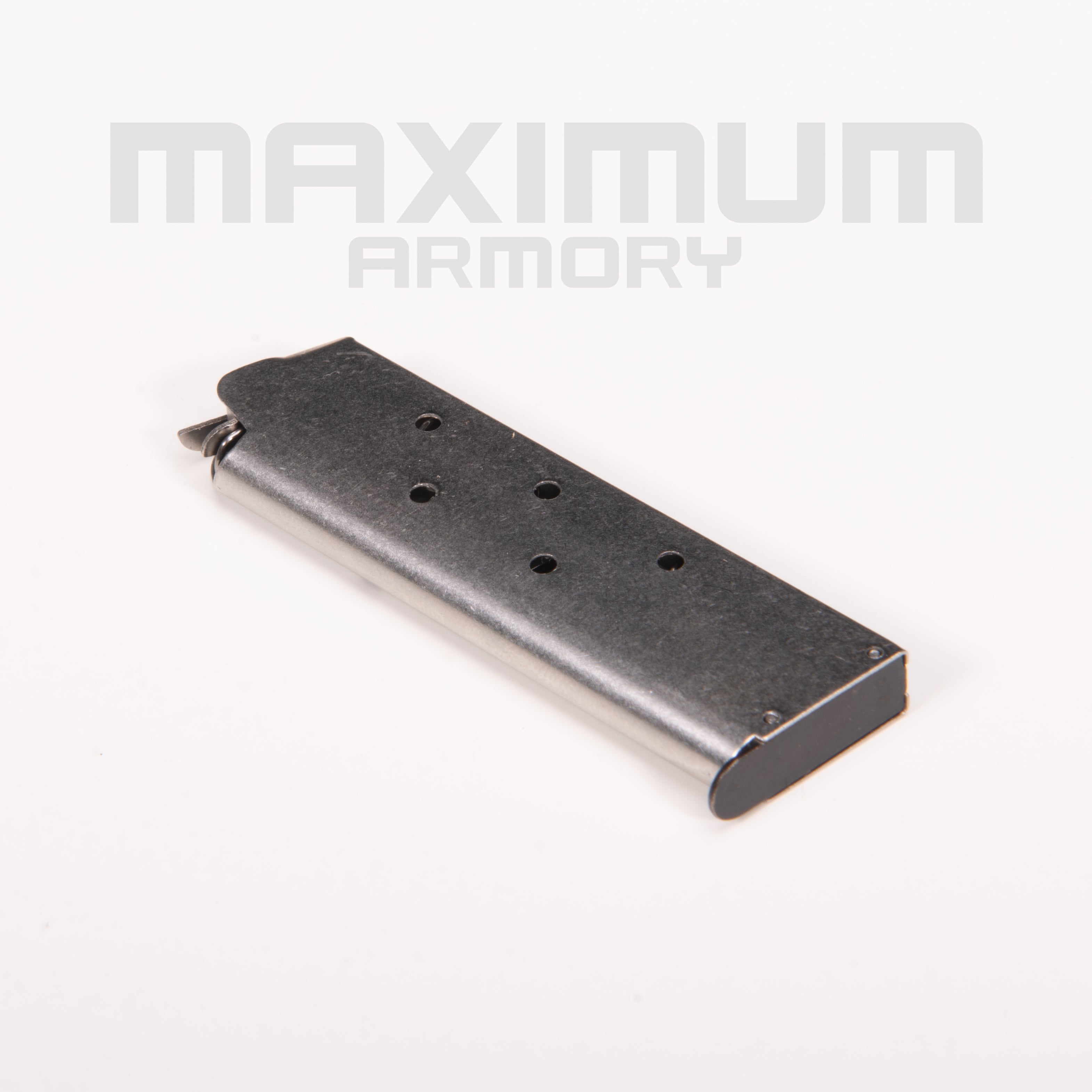 Top view of the M1911 1:2.05 Black/White Toy Guns Magazine, featuring a realistic and durable design for smooth loading and enhanced performance in toy gun models.