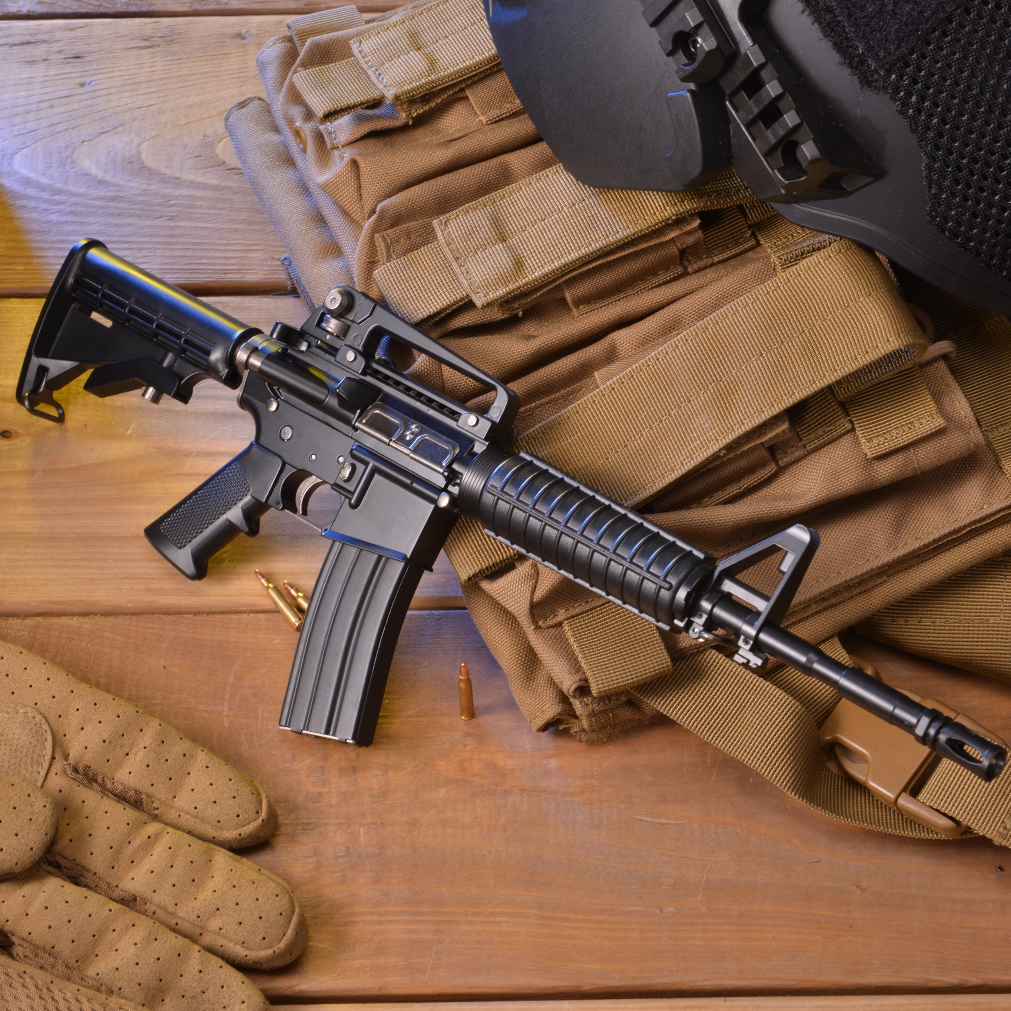 Detailed M4A1 miniature gun on a display stand, crafted as a realistic toy gun for collectors and military enthusiasts.